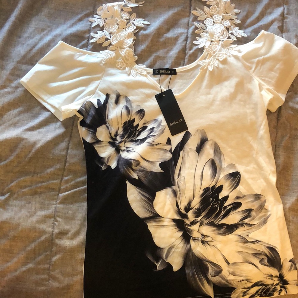 White and black flower print shirt
